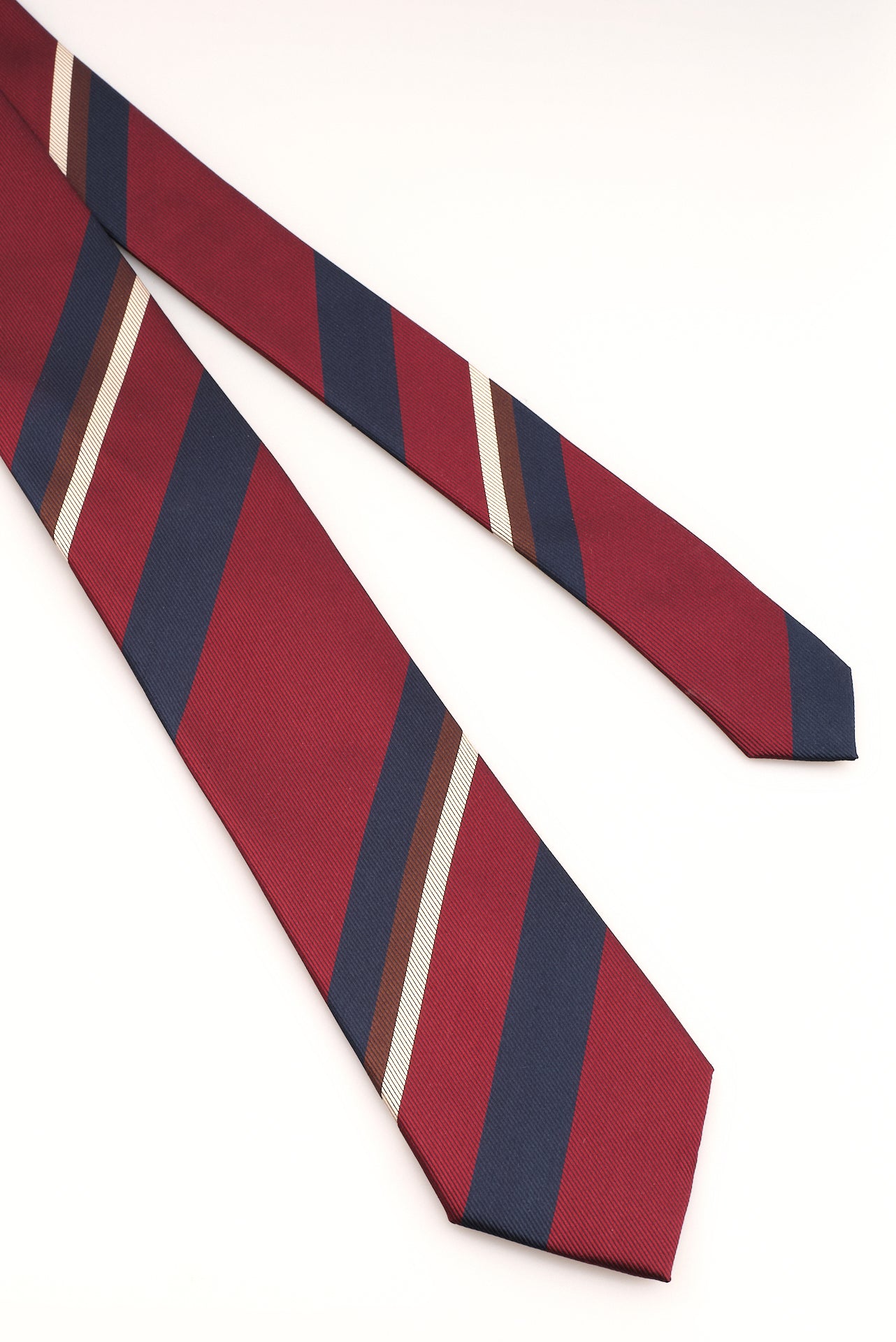 ΑΝΔΡΙΚΗ ΜΕΤΑΞΩΤΗ ΓΡΑΒΑΤΑ CLUB PORTOBELLO'S ΣΕ ΜΠΛΕ ΚΑΙ ΚΟΚΚΙΝΟ ΧΡΩΜΑ ΜΕ ΜΠΕΖ ΚΑΙ ΚΑΦΕ ΛΕΠΤΟΜΕΡΕΙΕΣ